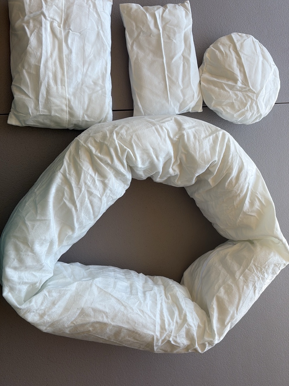 Newborn photo pillows and outfits
